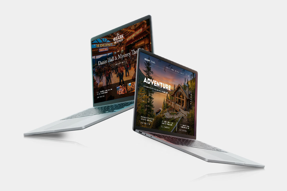 Two laptops showing website designs of Ozark Travel and Dance Hall and Mystery Theatre.